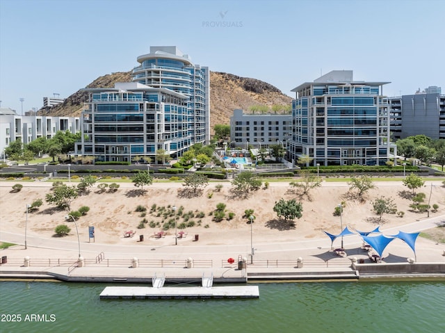 view of building exterior with a water view