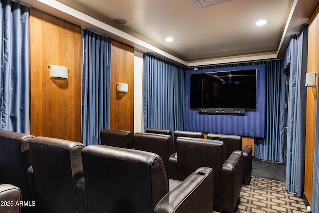 carpeted cinema room with recessed lighting