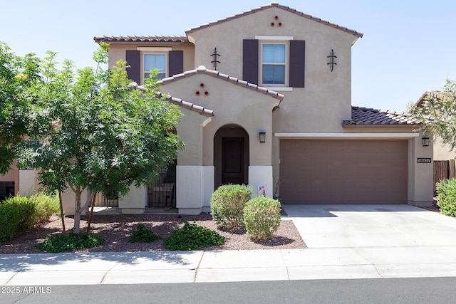 19937 W Heatherbrae Dr, Litchfield Park, AZ 85340 - mediterranean / spanish house featuring a tile roof, concrete driveway, a garage, and stucco siding