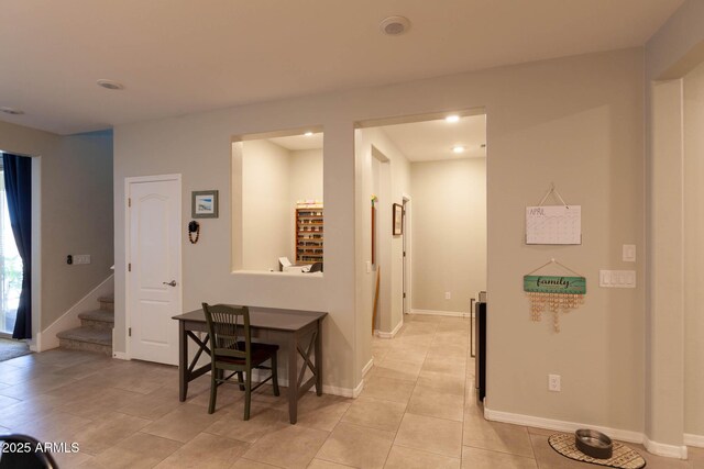 19937 W Heatherbrae Dr, Litchfield Park, AZ 85340 - dining room with stairway, light tile patterned flooring, baseboards, and recessed lighting