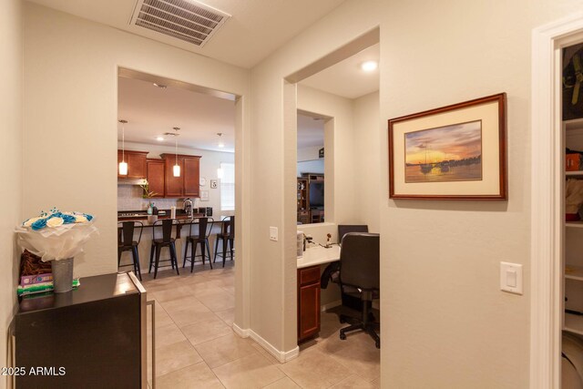 19937 W Heatherbrae Dr, Litchfield Park, AZ 85340 - hallway featuring light tile patterned flooring, an office area, and recessed lighting