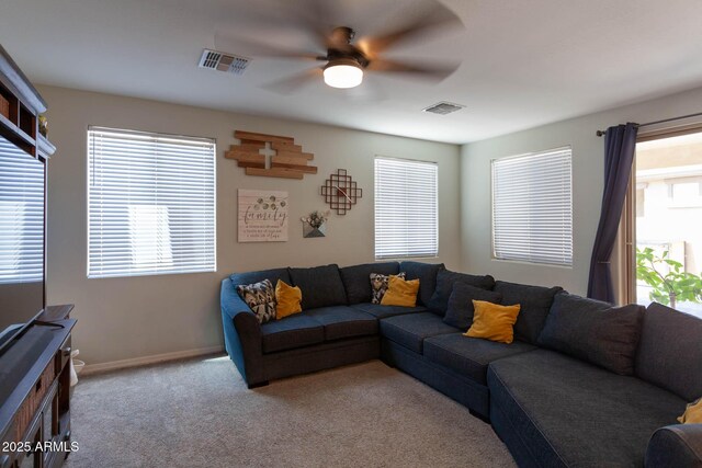 19937 W Heatherbrae Dr, Litchfield Park, AZ 85340 - living room with a ceiling fan, carpet floors, and plenty of natural light