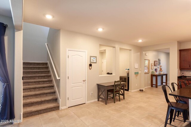 19937 W Heatherbrae Dr, Litchfield Park, AZ 85340 - staircase featuring recessed lighting, tile patterned flooring, and baseboards
