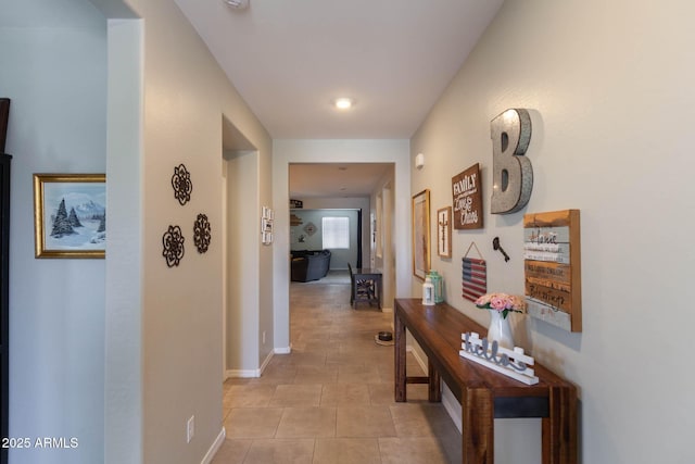 19937 W Heatherbrae Dr, Litchfield Park, AZ 85340 - hall with baseboards and light tile patterned flooring
