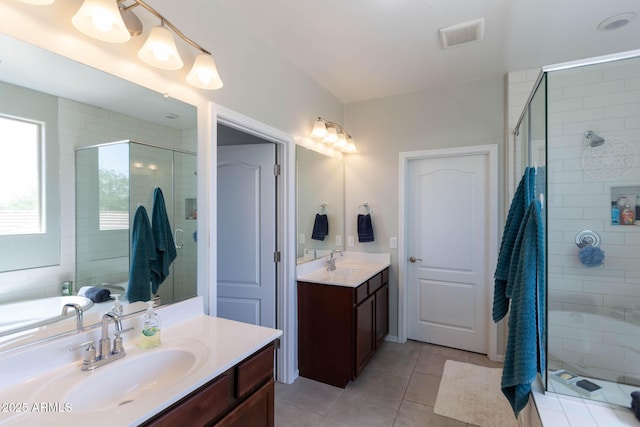 19937 W Heatherbrae Dr, Litchfield Park, AZ 85340 - full bathroom with a stall shower, tile patterned floors, and two vanities