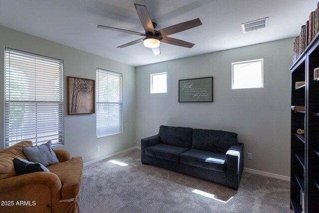 19937 W Heatherbrae Dr, Litchfield Park, AZ 85340 - carpeted living area featuring a ceiling fan and baseboards
