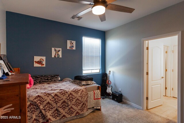 19937 W Heatherbrae Dr, Litchfield Park, AZ 85340 - carpeted bedroom with ceiling fan and baseboards