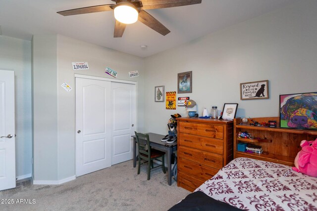 19937 W Heatherbrae Dr, Litchfield Park, AZ 85340 - carpeted bedroom with a closet, a ceiling fan, and baseboards