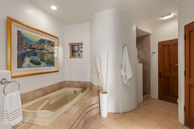 bathroom featuring tile patterned floors and plus walk in shower