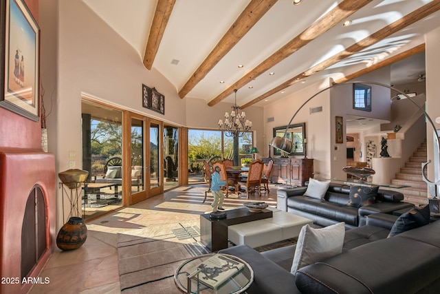 living room featuring a notable chandelier, beam ceiling, french doors, and a high ceiling