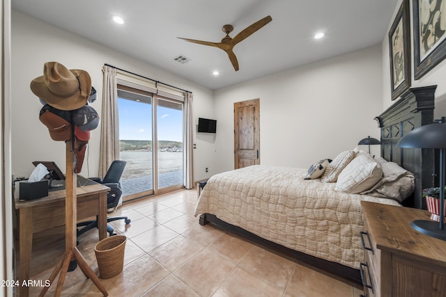 tiled bedroom with ceiling fan and access to outside