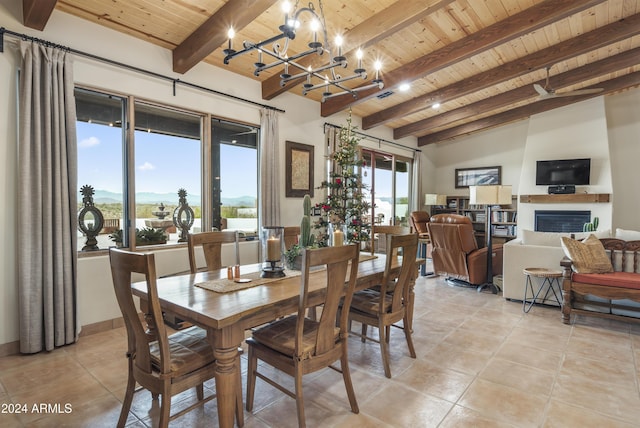 tiled dining space featuring vaulted ceiling with beams, wooden ceiling, and an inviting chandelier