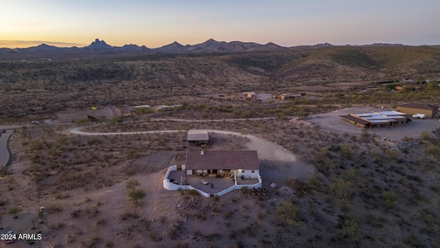 aerial view at dusk with a mountain view