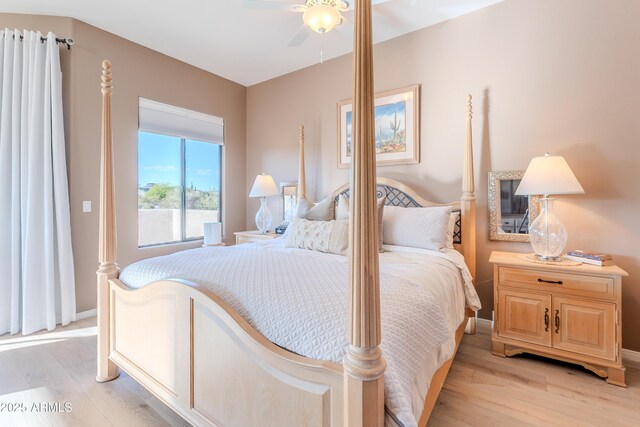 10772 E Running Deer Trl, Scottsdale, AZ 85262 - bedroom with light wood-style floors, baseboards, and ceiling fan