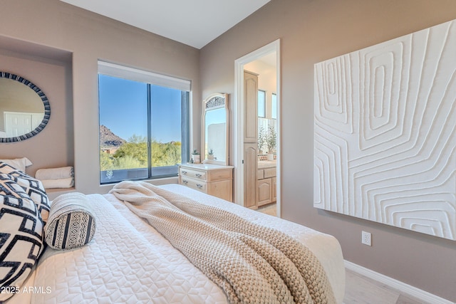 10772 E Running Deer Trl, Scottsdale, AZ 85262 - bedroom with baseboards and ensuite bathroom