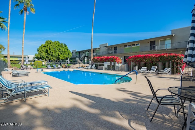 view of pool with a patio