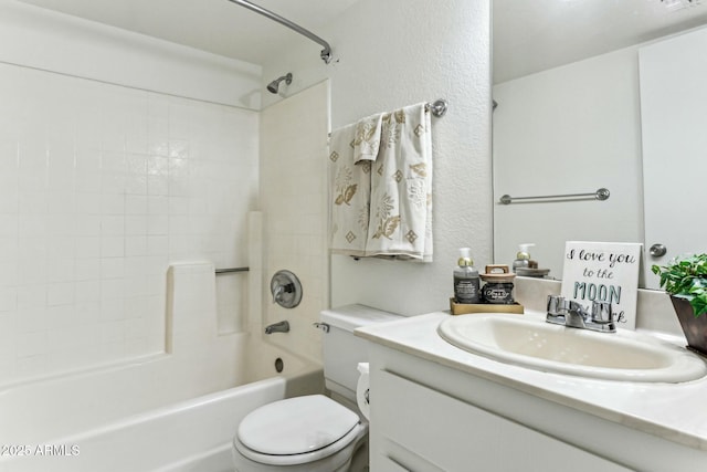 full bathroom featuring washtub / shower combination, toilet, and vanity