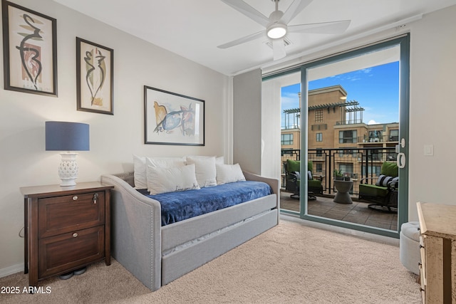 bedroom featuring carpet, ceiling fan, and access to outside