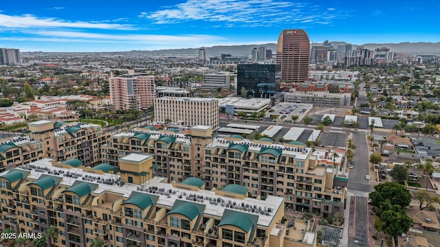 birds eye view of property with a city view