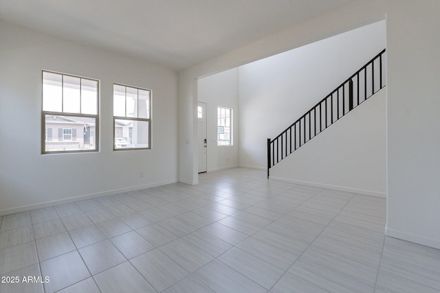 entryway with light tile patterned floors