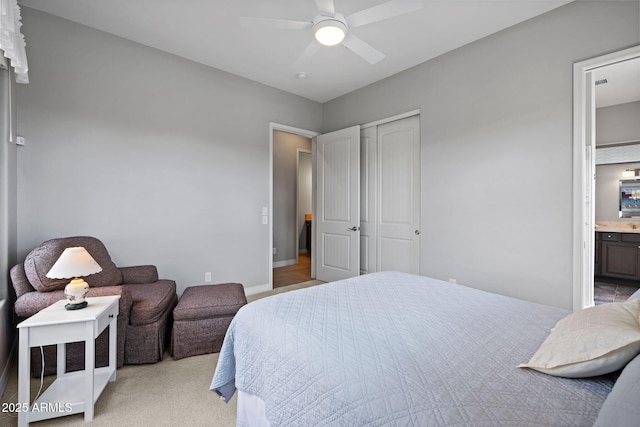 1385 Ridgewood Dr, Prescott, AZ 86305 - bedroom featuring light colored carpet, ensuite bath, ceiling fan, and baseboards