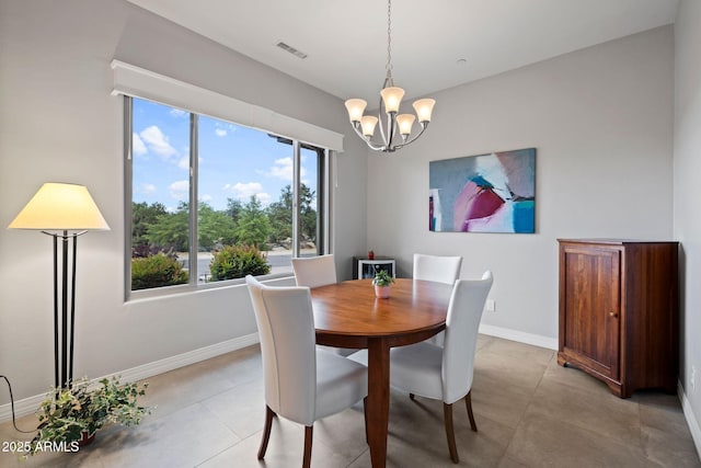 1385 Ridgewood Dr, Prescott, AZ 86305 - dining space with a chandelier, plenty of natural light, and baseboards