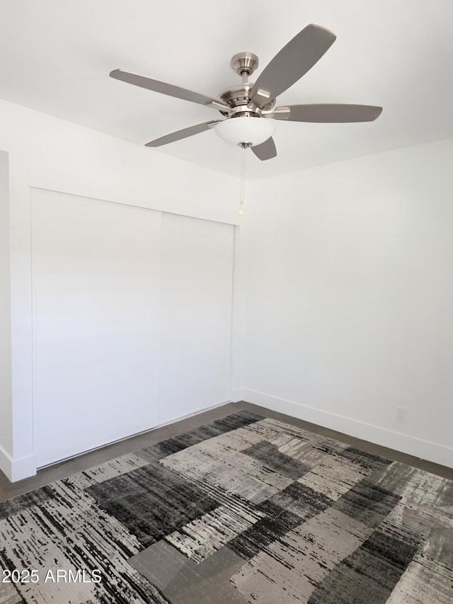 4050 E Cactus Rd Unit 107, Phoenix, AZ 85032 - unfurnished room with a ceiling fan and baseboards
