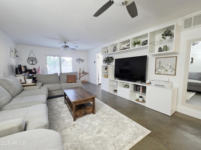 4050 E Cactus Rd Unit 107, Phoenix, AZ 85032 - living room featuring a ceiling fan, concrete floors, and built in shelves