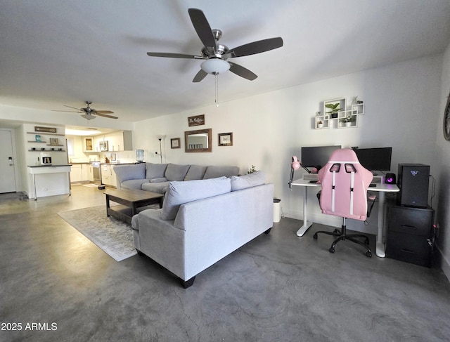 4050 E Cactus Rd Unit 107, Phoenix, AZ 85032 - living area featuring a ceiling fan, finished concrete flooring, and a desk