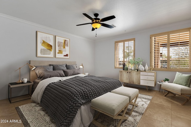 bedroom featuring ceiling fan, crown molding, and light tile patterned flooring