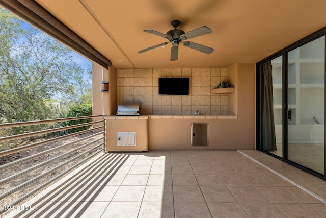 view of patio / terrace featuring ceiling fan, area for grilling, and a balcony