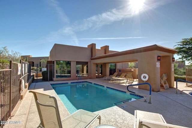 view of pool featuring a patio area