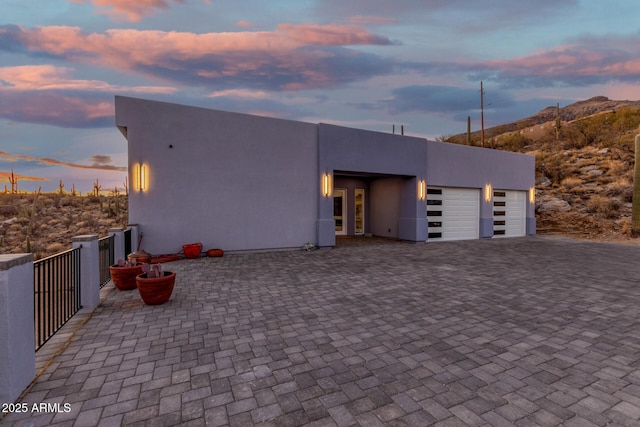 view of front of home with a garage