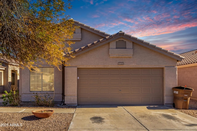 view of front of house with a garage