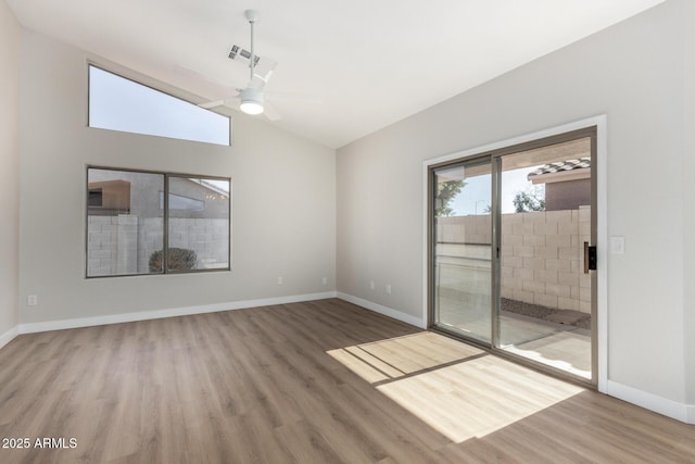 unfurnished living room featuring vaulted ceiling, ceiling fan, and hardwood / wood-style floors