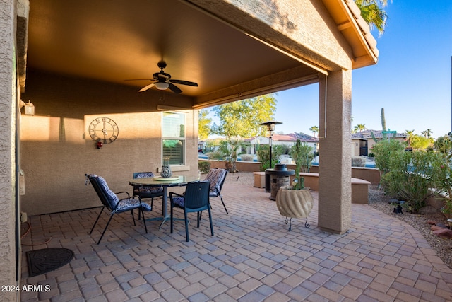 view of patio / terrace featuring ceiling fan