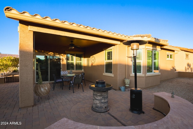 view of patio / terrace featuring ceiling fan