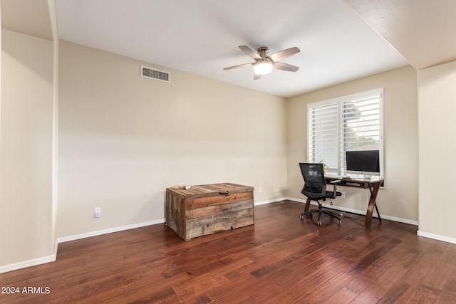 office with dark wood-type flooring and ceiling fan