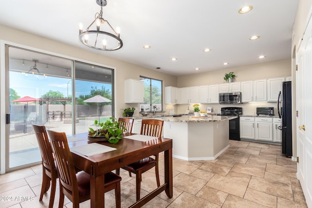 dining room featuring a chandelier