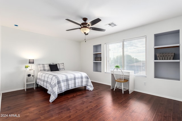 bedroom featuring ceiling fan and dark hardwood / wood-style floors