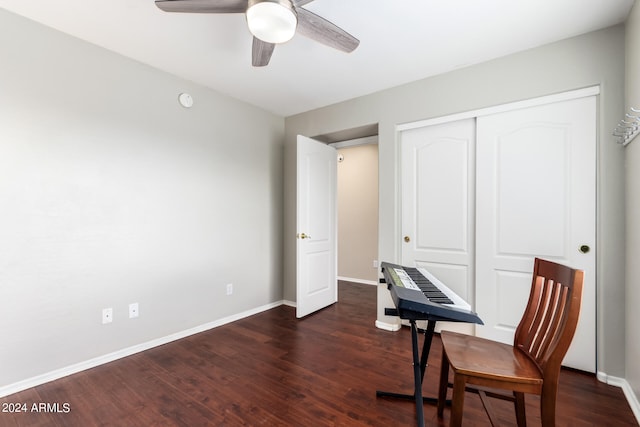 interior space featuring ceiling fan and dark hardwood / wood-style floors