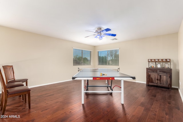 game room featuring dark wood-type flooring and ceiling fan