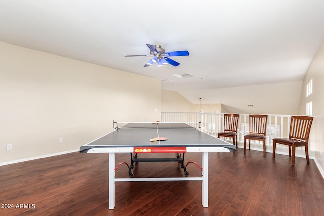 game room featuring ceiling fan, dark hardwood / wood-style flooring, and vaulted ceiling