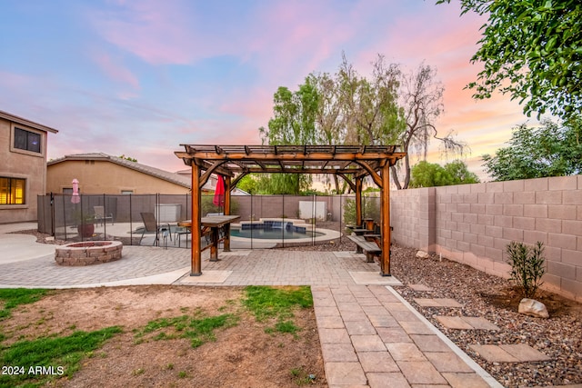 yard at dusk with a fenced in pool, a pergola, a patio, and an outdoor fire pit