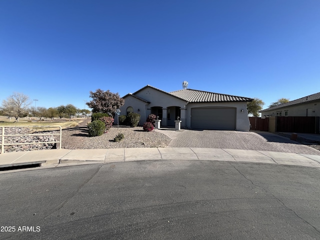 view of front of property with a garage