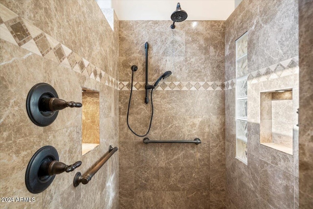 details featuring tiled shower