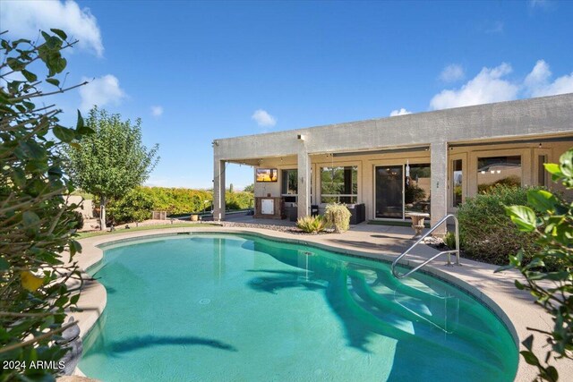 view of pool with a patio