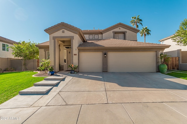 view of front facade featuring a front lawn and a garage