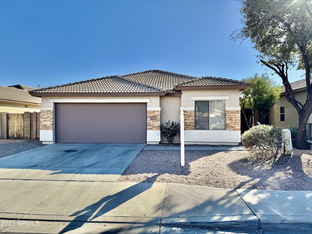 view of front of home with a garage