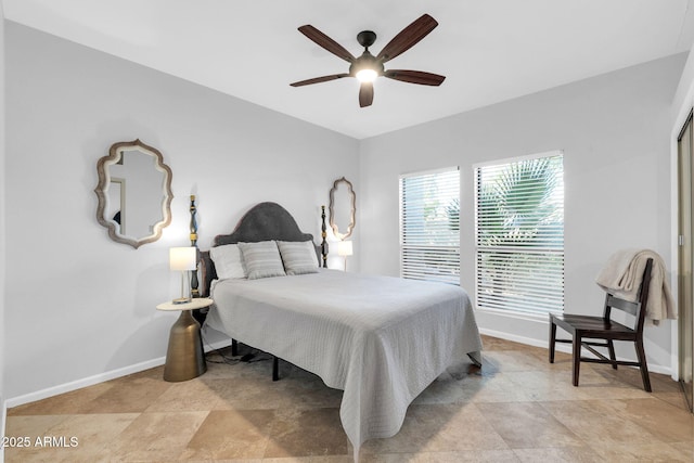 bedroom featuring ceiling fan